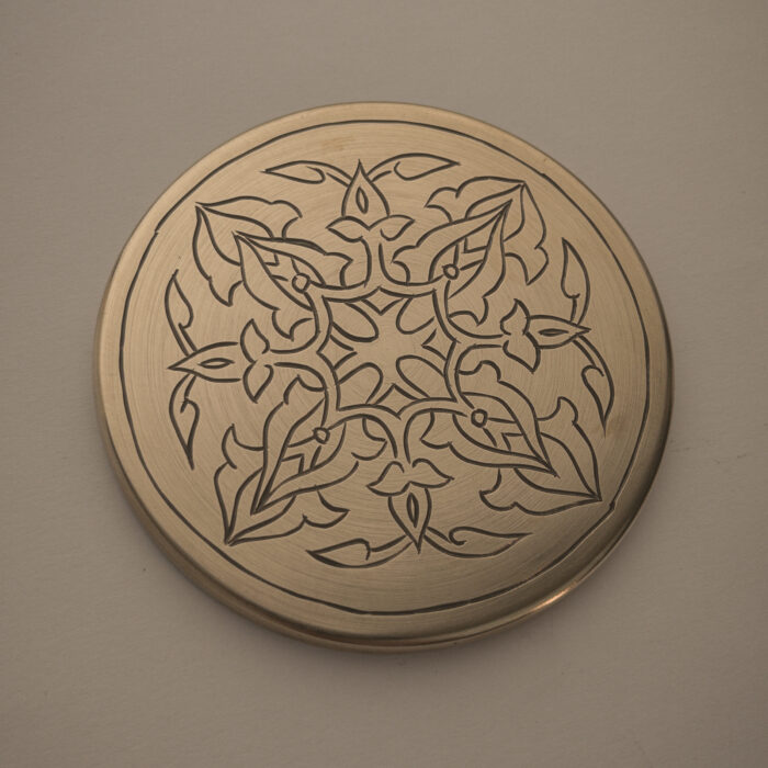 HAND-ENGRAVED BRASS COASTER